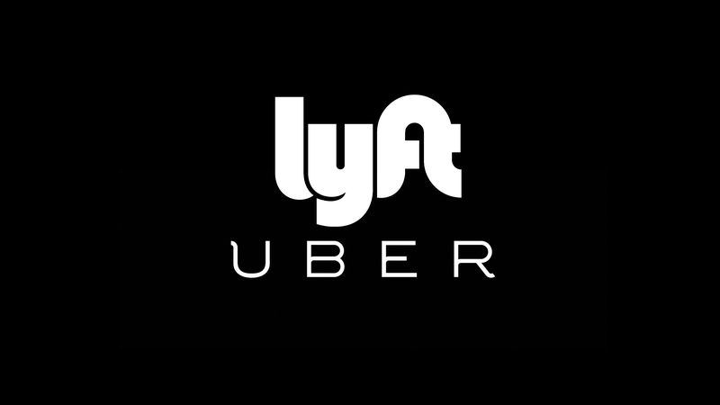 Uber-Lyft text logos on black background